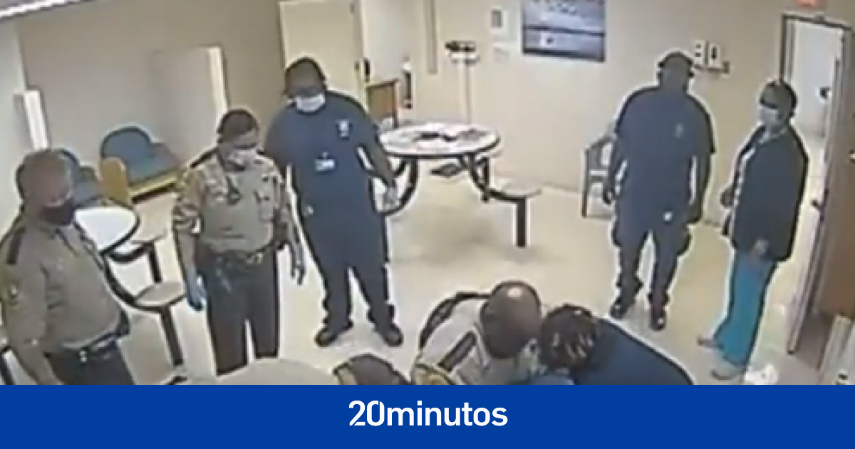 Police officers restrain and choke an African-American man in the U.S.