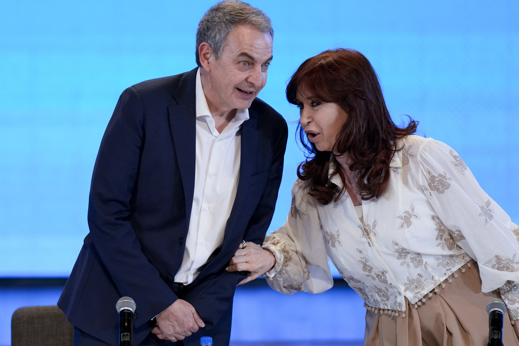 Argentina's Vice President Cristina Fernandez, right, talks with former Spanish Prime Minister Jose Luis Rodriguez Zapatero at a meeting of the Puebla group during the 3rd World Forum on Human Rights.